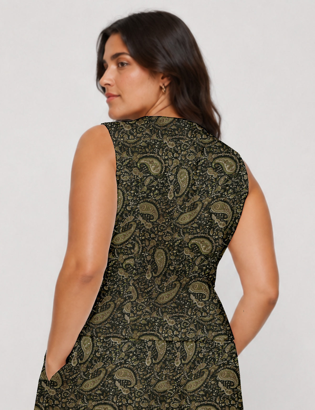 Women's fitted waistcoat with V-neck, single-breasted button closure, tailored silhouette, and pointed hem in sustainable fashion.