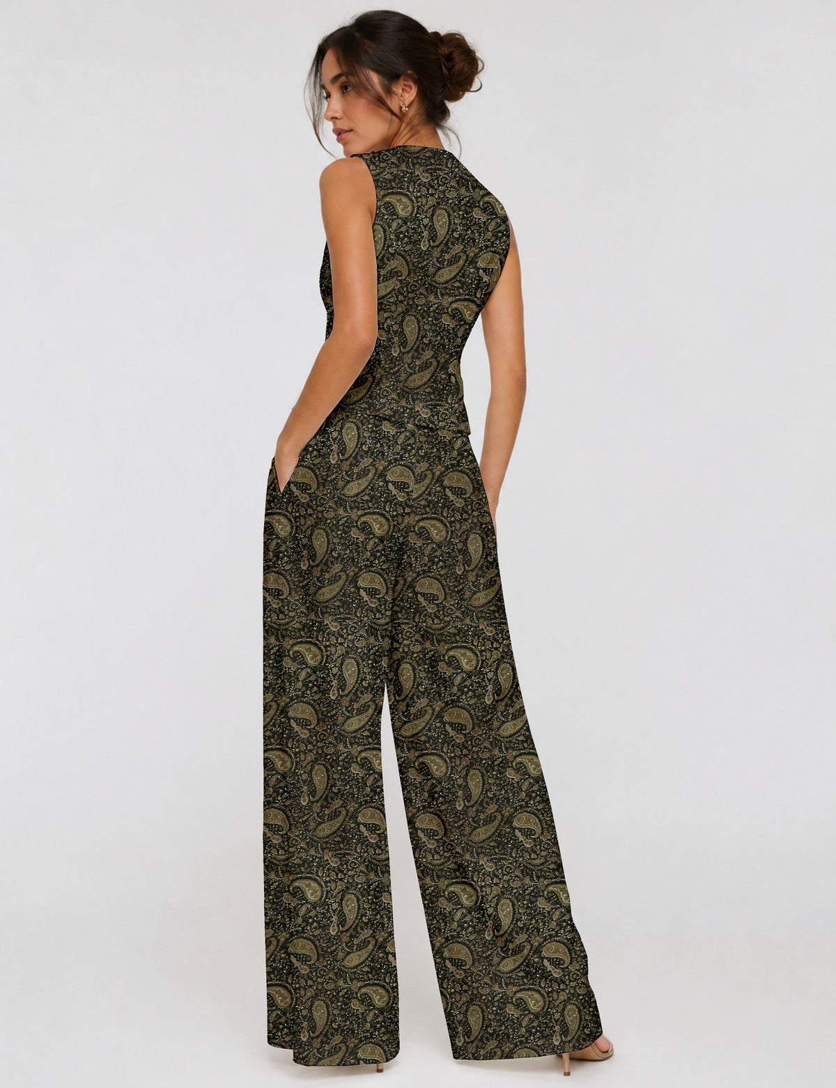 Women's tailored waistcoat set with a sleeveless V-neck button-front waistcoat and high-rise wide leg trousers in a coordinated matching outfit.