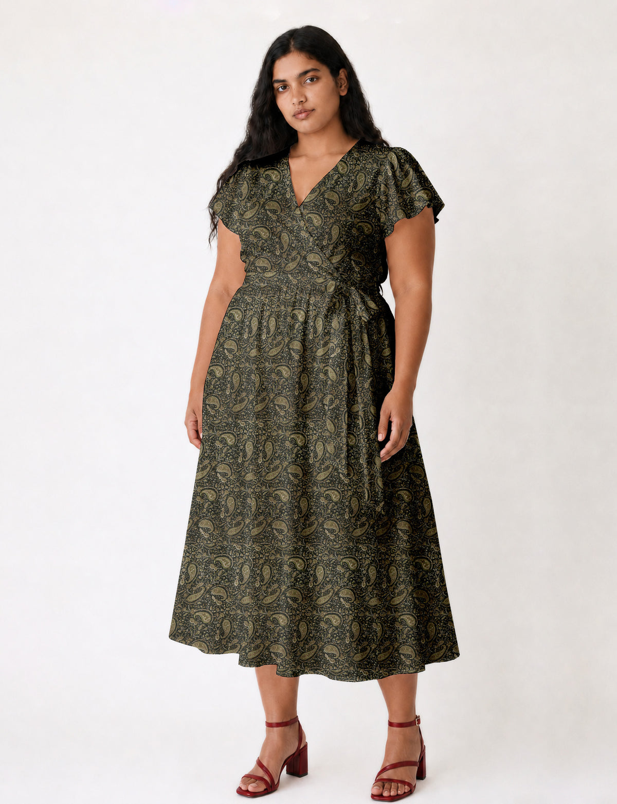 Elegant midi wrap dress with a V-neckline, adjustable waist tie, fitted bodice, and flared skirt for a timeless, flattering silhouette.