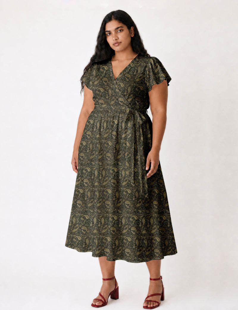 Elegant midi wrap dress with a V-neckline, adjustable waist tie, fitted bodice, and flared skirt for a timeless, flattering silhouette.
