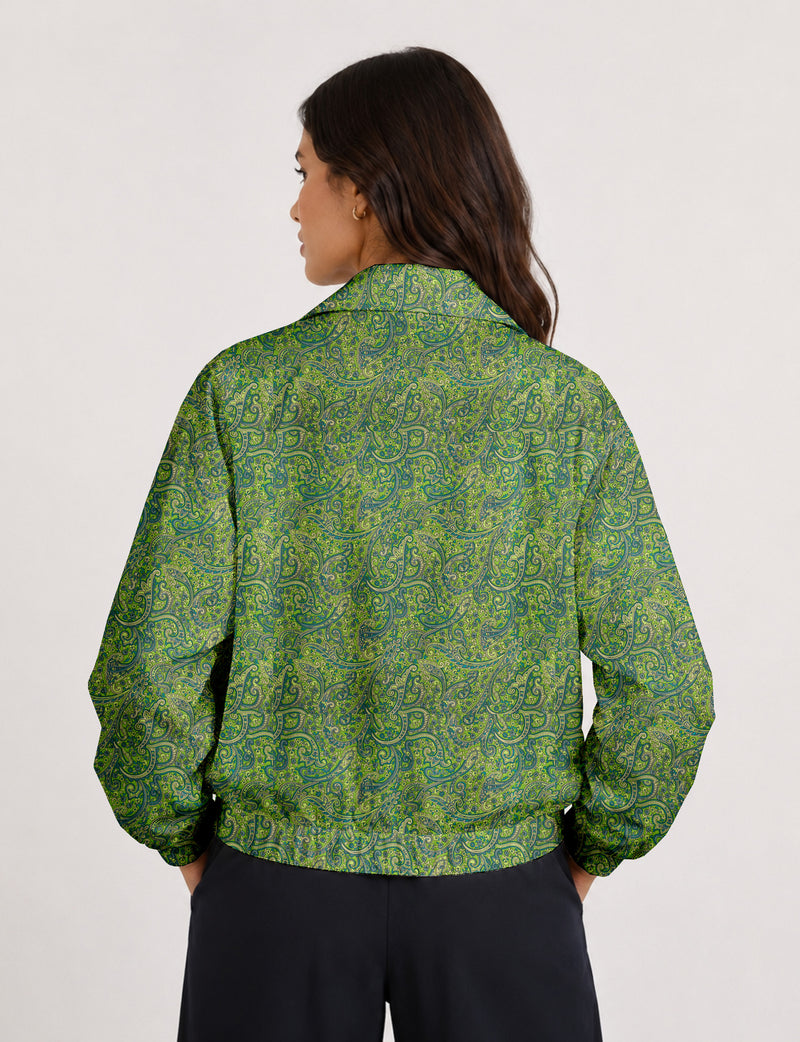 Brown floral bomber jacket with front zipper, elastic cuffs and hem, hanging on white hanger, red floral inner lining visible
