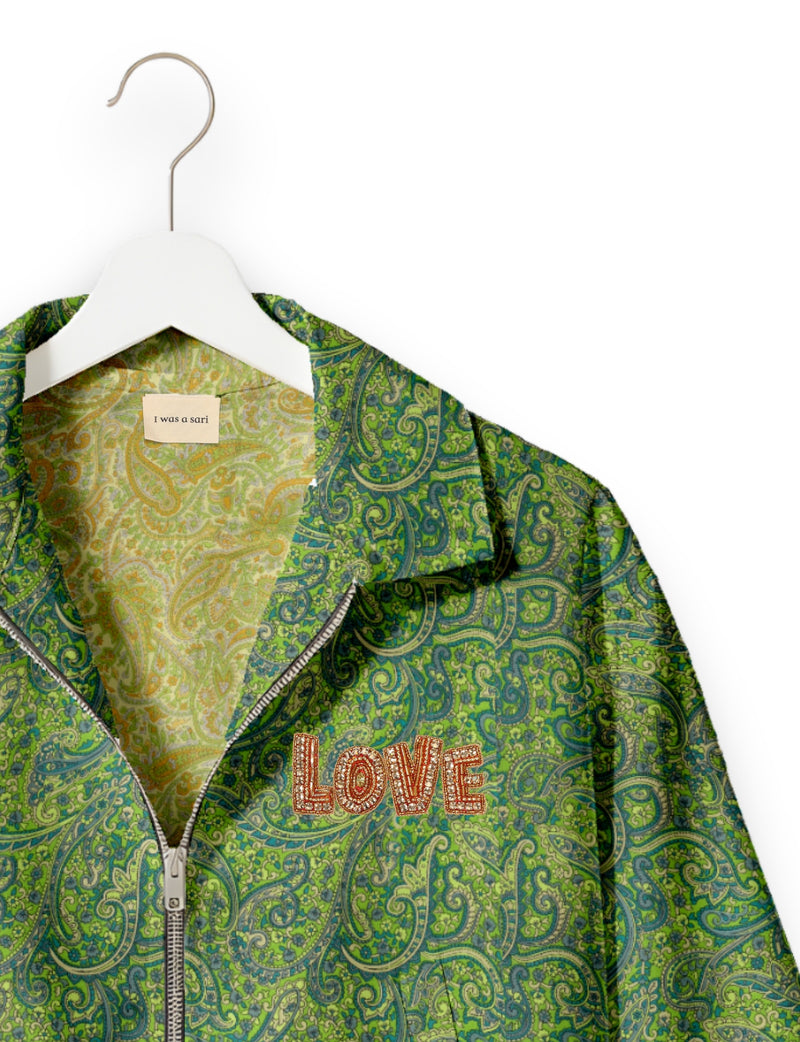 Love Bomber Jacket made from recycled fabric, featuring hand-stitched Aari embroidery. A unique piece of zero-waste clothing, part of the circular fashion movement. Designed with upcycled materials for a stylish yet environmentally friendly clothing choice.