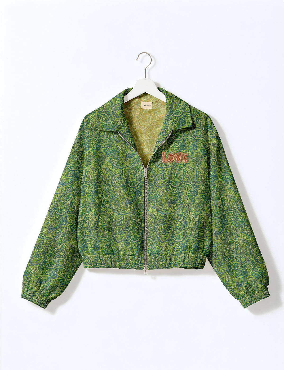 Love Bomber Jacket made from recycled fabric, featuring hand-stitched Aari embroidery. A unique piece of zero-waste clothing, part of the circular fashion movement. Designed with upcycled materials for a stylish yet environmentally friendly clothing choice.