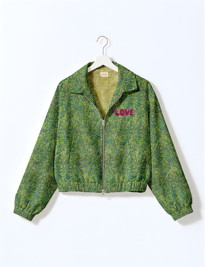Love Bomber Jacket made from recycled fabric, featuring hand-stitched Aari embroidery. A unique piece of zero-waste clothing, part of the circular fashion movement. Designed with upcycled materials for a stylish yet environmentally friendly clothing choice.