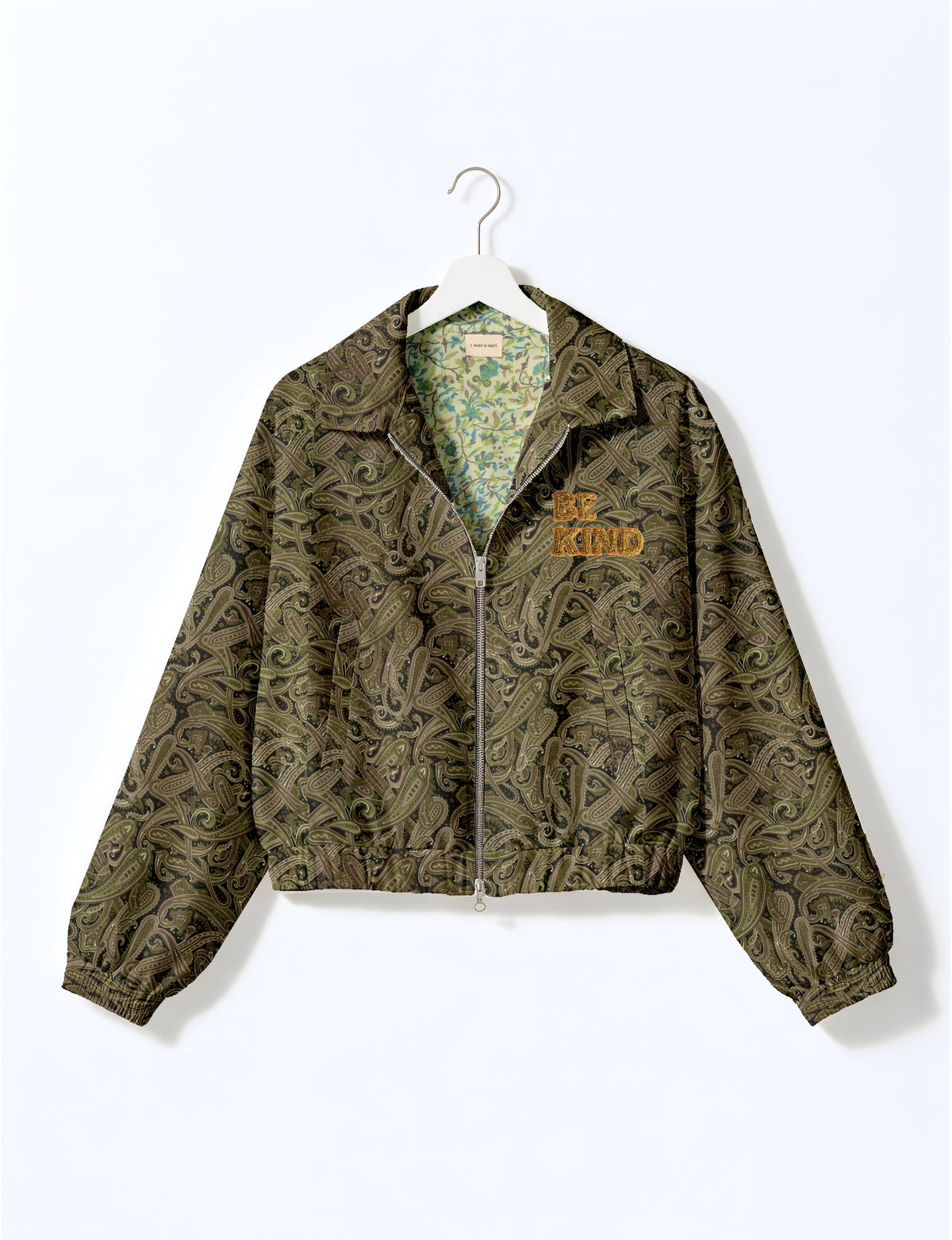 BE KIND Bomber jacket made from upcycled sari fabric with handcrafted Aari embroidery by female artisans.