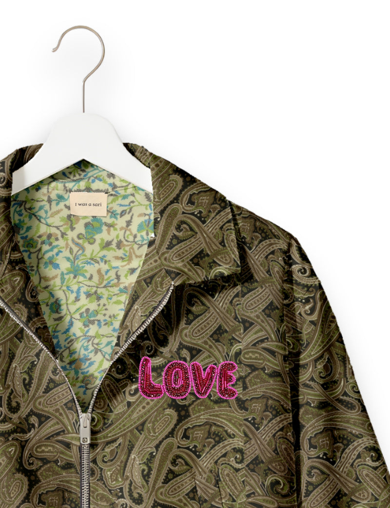 Love Bomber Jacket made from recycled fabric, featuring hand-stitched Aari embroidery. A unique piece of zero-waste clothing, part of the circular fashion movement. Designed with upcycled materials for a stylish yet environmentally friendly clothing choice.