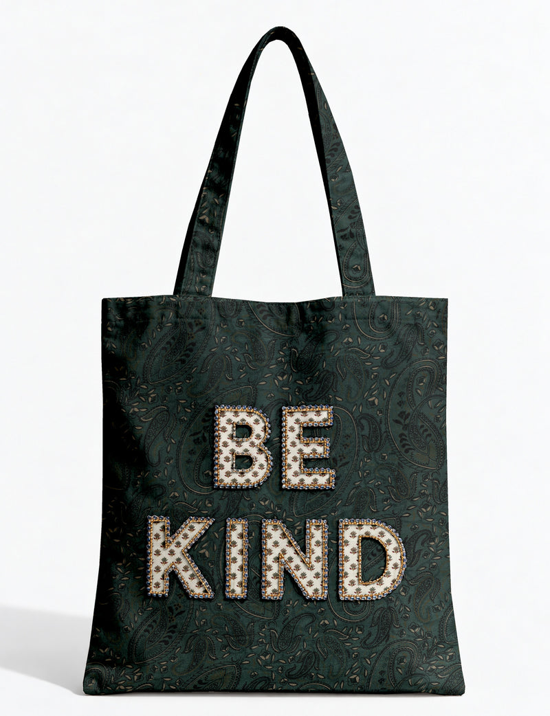 Be Kind tote bag with contrast sari fabric appliqué lettering, double shoulder straps, and front slip pocket.