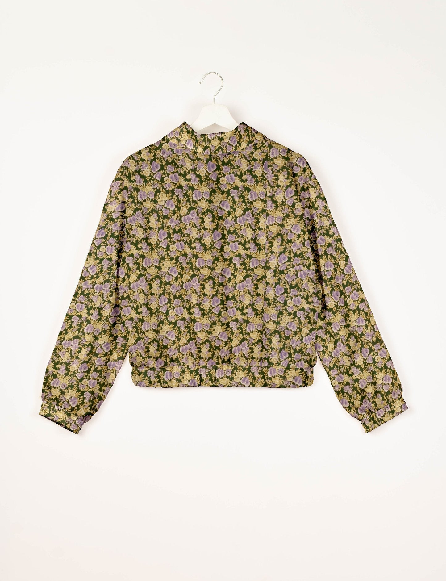 Stylish BOMBER JACKET, an upcycled clothing masterpiece with a cute cropped shape, elasticated details, and detachable metallic zipper. Contrast sari print lining adds a unique touch. Explore sustainable and eco-friendly fashion.