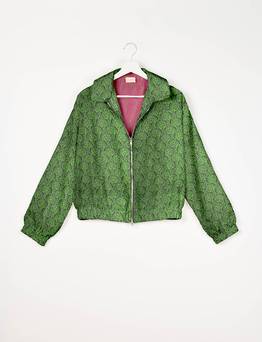 Upcycled Bomber Jacket made from recycled sari materials, featuring a cute cropped shape, elasticated hem and cuffs, and contrast sari print lining. Sustainable apparel promoting eco-friendly fashion and ethical clothing.