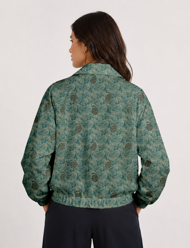 Brown floral bomber jacket with front zipper, elastic cuffs and hem, hanging on white hanger, red floral inner lining visible