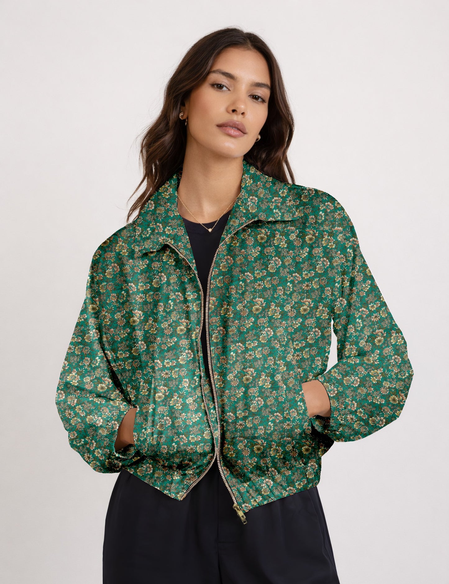 Upcycled Bomber Jacket made from recycled sari materials, featuring a cute cropped shape, elasticated hem and cuffs, and contrast sari print lining. Sustainable apparel promoting eco-friendly fashion and ethical clothing.