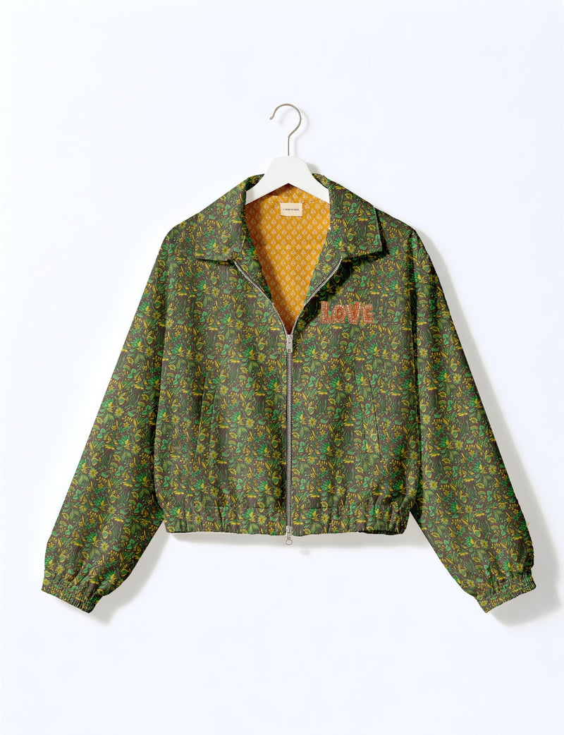 Love Bomber Jacket made from recycled fabric, featuring hand-stitched Aari embroidery. A unique piece of zero-waste clothing, part of the circular fashion movement. Designed with upcycled materials for a stylish yet environmentally friendly clothing choice.