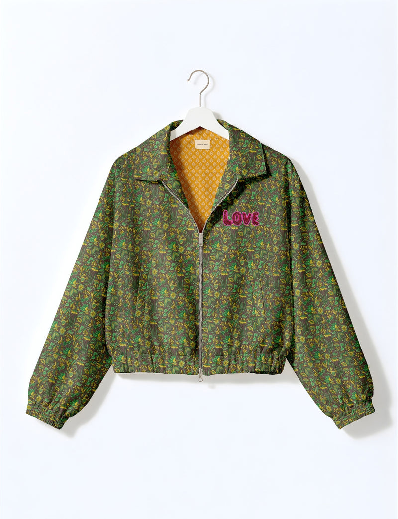 Love Bomber Jacket made from recycled fabric, featuring hand-stitched Aari embroidery. A unique piece of zero-waste clothing, part of the circular fashion movement. Designed with upcycled materials for a stylish yet environmentally friendly clothing choice.