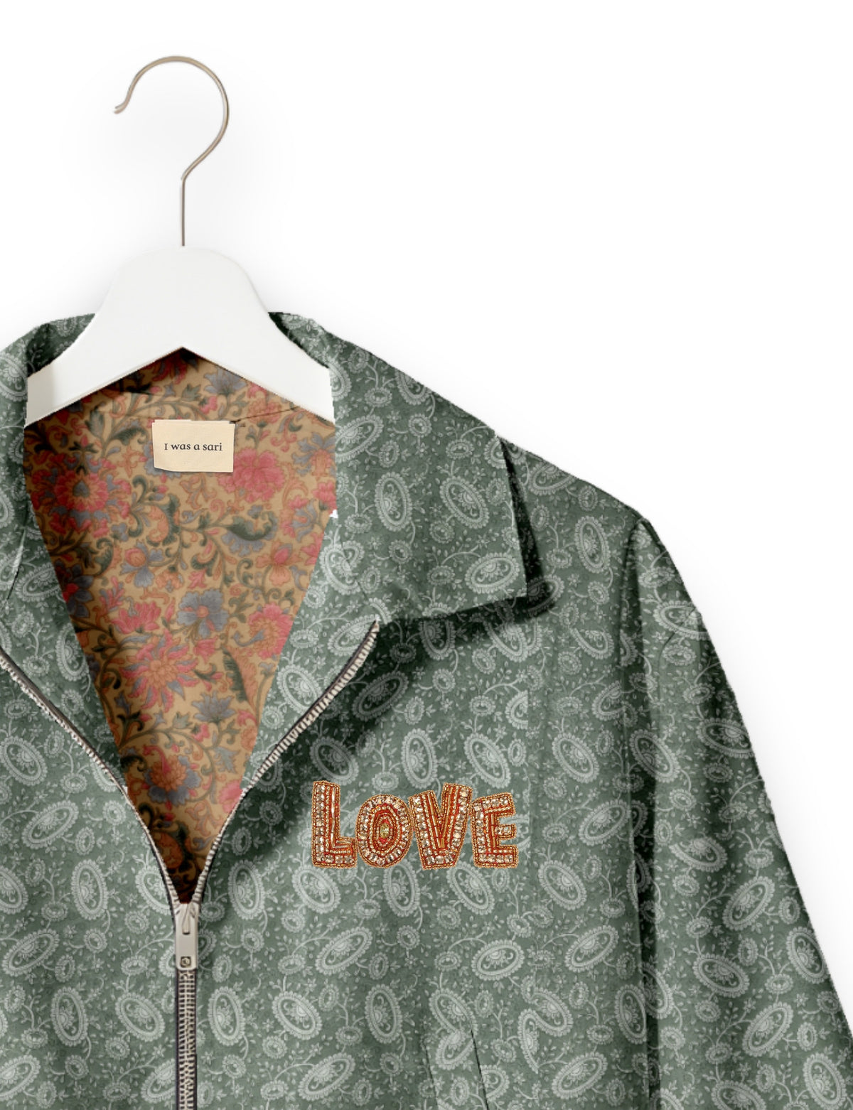 Love Bomber Jacket made from recycled fabric, featuring hand-stitched Aari embroidery. A unique piece of zero-waste clothing, part of the circular fashion movement. Designed with upcycled materials for a stylish yet environmentally friendly clothing choice.