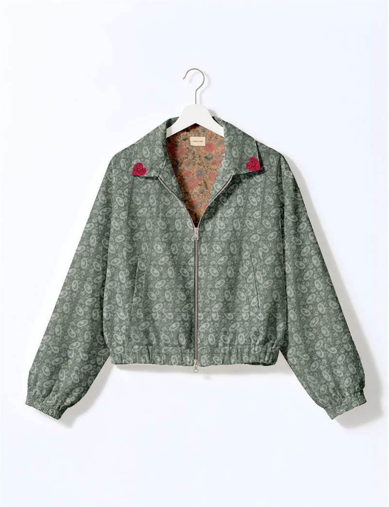 Love Bomber Jacket made from recycled fabric, featuring hand-stitched Aari embroidery. A unique piece of zero-waste clothing, part of the circular fashion movement. Designed with upcycled materials for a stylish yet environmentally friendly clothing choice.