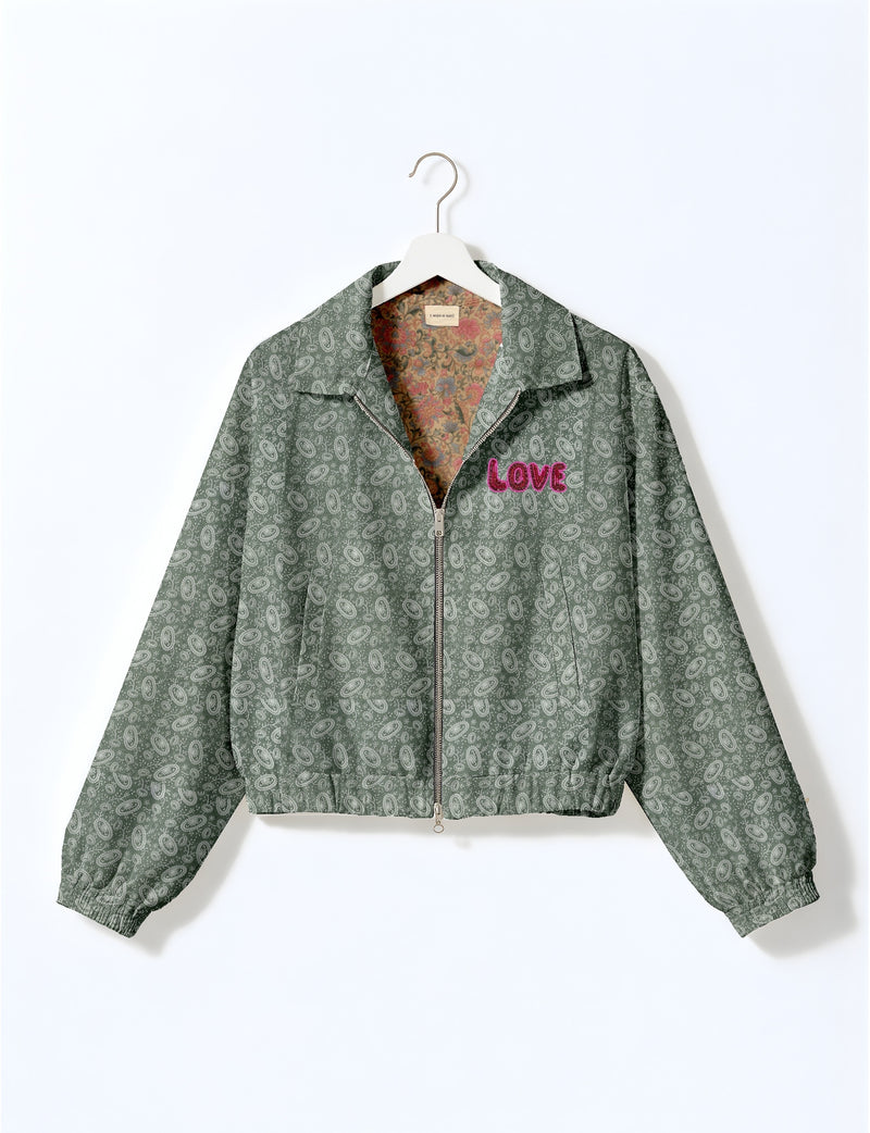 Love Bomber Jacket made from recycled fabric, featuring hand-stitched Aari embroidery. A unique piece of zero-waste clothing, part of the circular fashion movement. Designed with upcycled materials for a stylish yet environmentally friendly clothing choice.