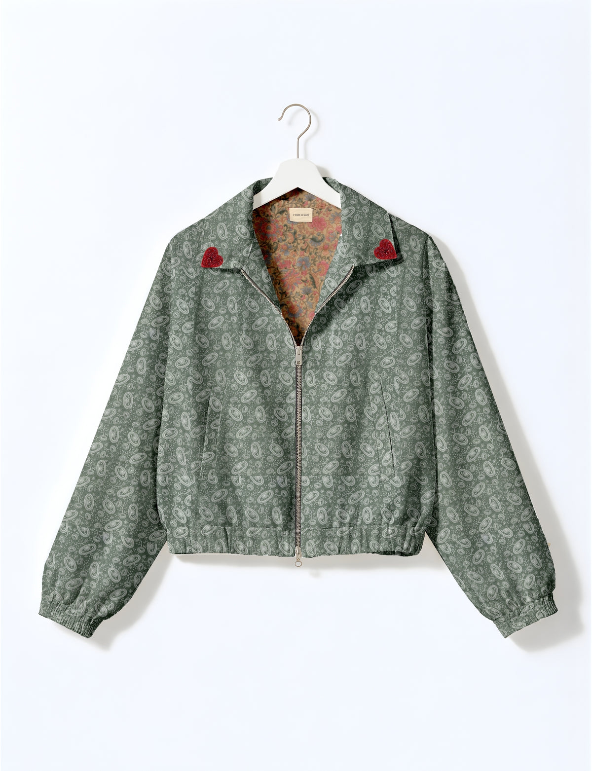 Love Bomber Jacket made from recycled fabric, featuring hand-stitched Aari embroidery. A unique piece of zero-waste clothing, part of the circular fashion movement. Designed with upcycled materials for a stylish yet environmentally friendly clothing choice.