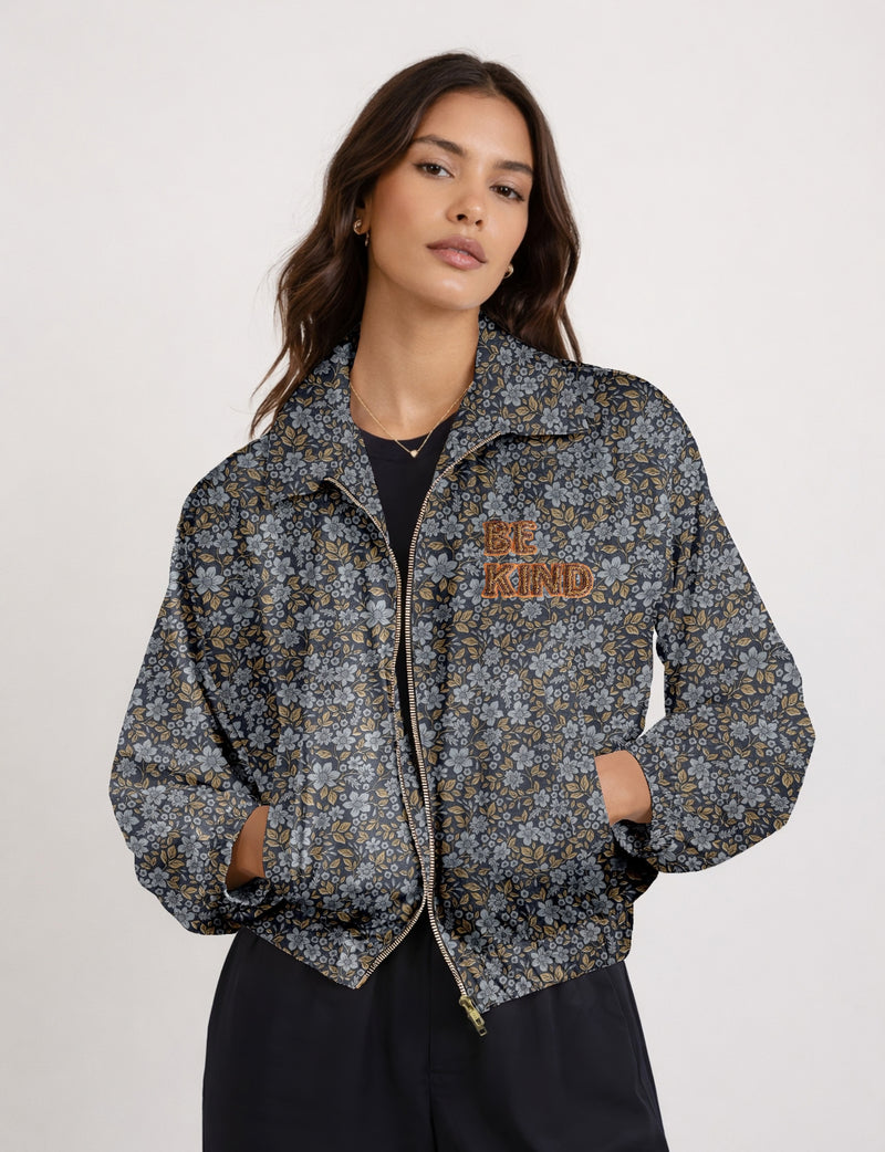 BE KIND Bomber jacket made from upcycled sari fabric with handcrafted Aari embroidery by female artisans.