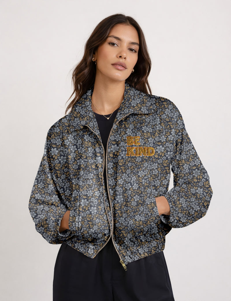 BE KIND Bomber jacket made from upcycled sari fabric with handcrafted Aari embroidery by female artisans.