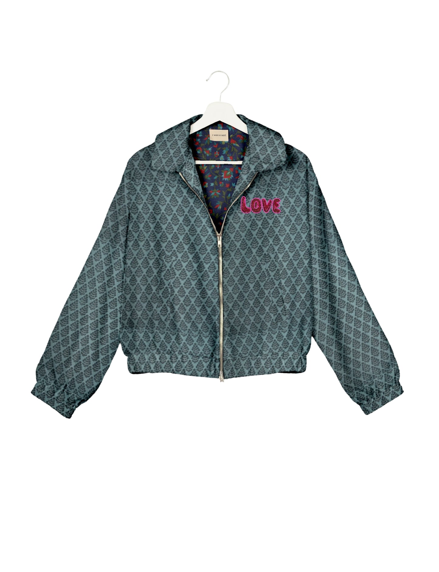 Love Bomber Jacket made from recycled fabric, featuring hand-stitched Aari embroidery. A unique piece of zero-waste clothing, part of the circular fashion movement. Designed with upcycled materials for a stylish yet environmentally friendly clothing choice.