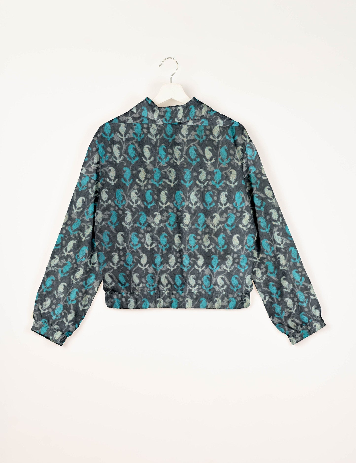 Love Bomber Jacket made from recycled fabric, featuring hand-stitched Aari embroidery. A unique piece of zero-waste clothing, part of the circular fashion movement. Designed with upcycled materials for a stylish yet environmentally friendly clothing choice.