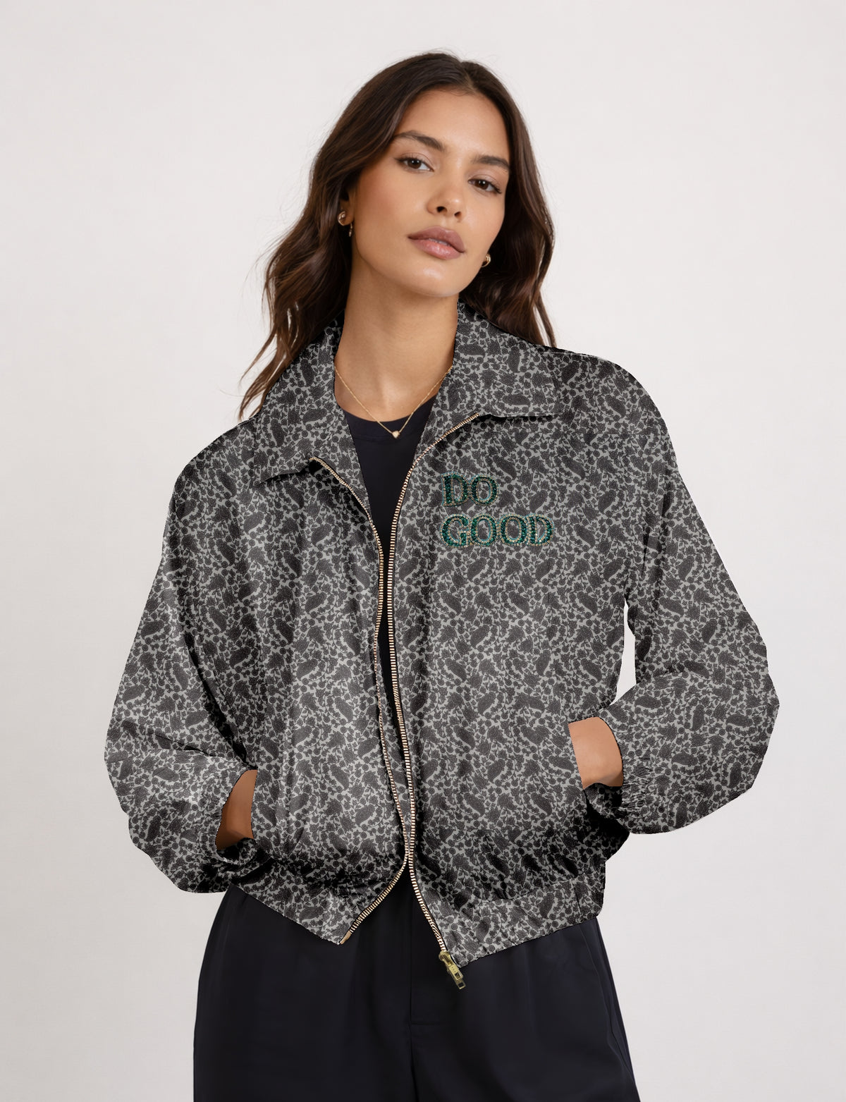 Green cropped bomber jacket with DO GOOD hand embroidery on the left chest and contrasting inner.