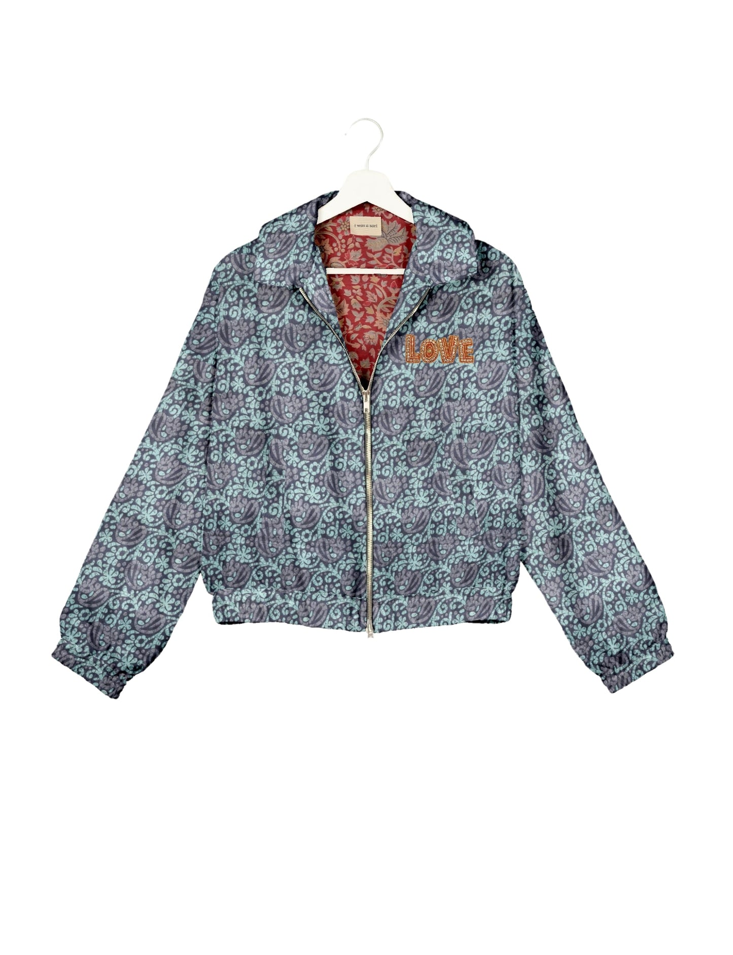 Love Bomber Jacket made from recycled fabric, featuring hand-stitched Aari embroidery. A unique piece of zero-waste clothing, part of the circular fashion movement. Designed with upcycled materials for a stylish yet environmentally friendly clothing choice.