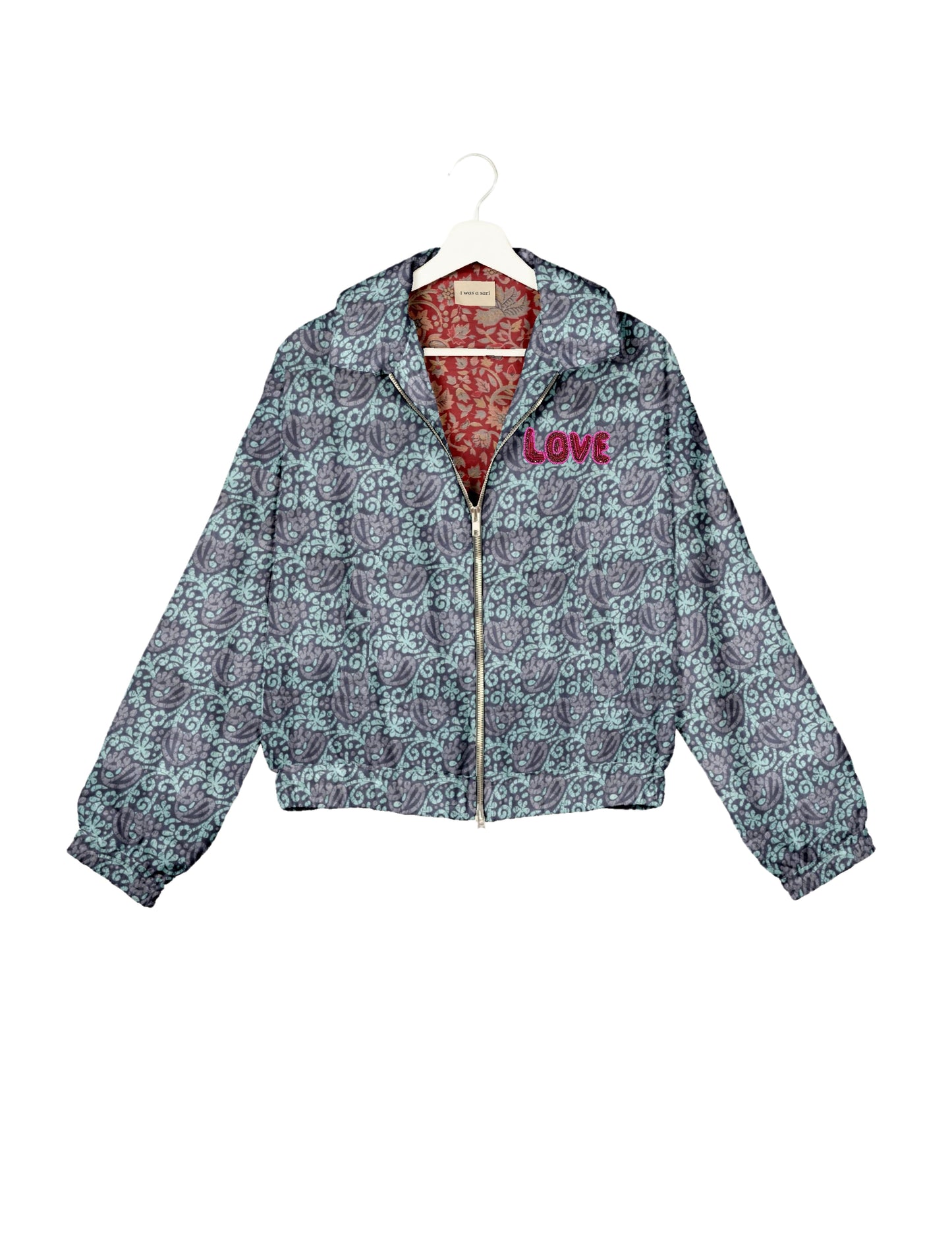 Love Bomber Jacket made from recycled fabric, featuring hand-stitched Aari embroidery. A unique piece of zero-waste clothing, part of the circular fashion movement. Designed with upcycled materials for a stylish yet environmentally friendly clothing choice.