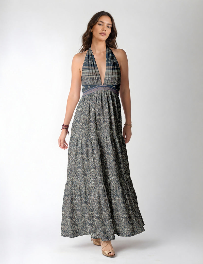 Maxi tiered dress by I was a Sari with halter neckline and flowy silhouette