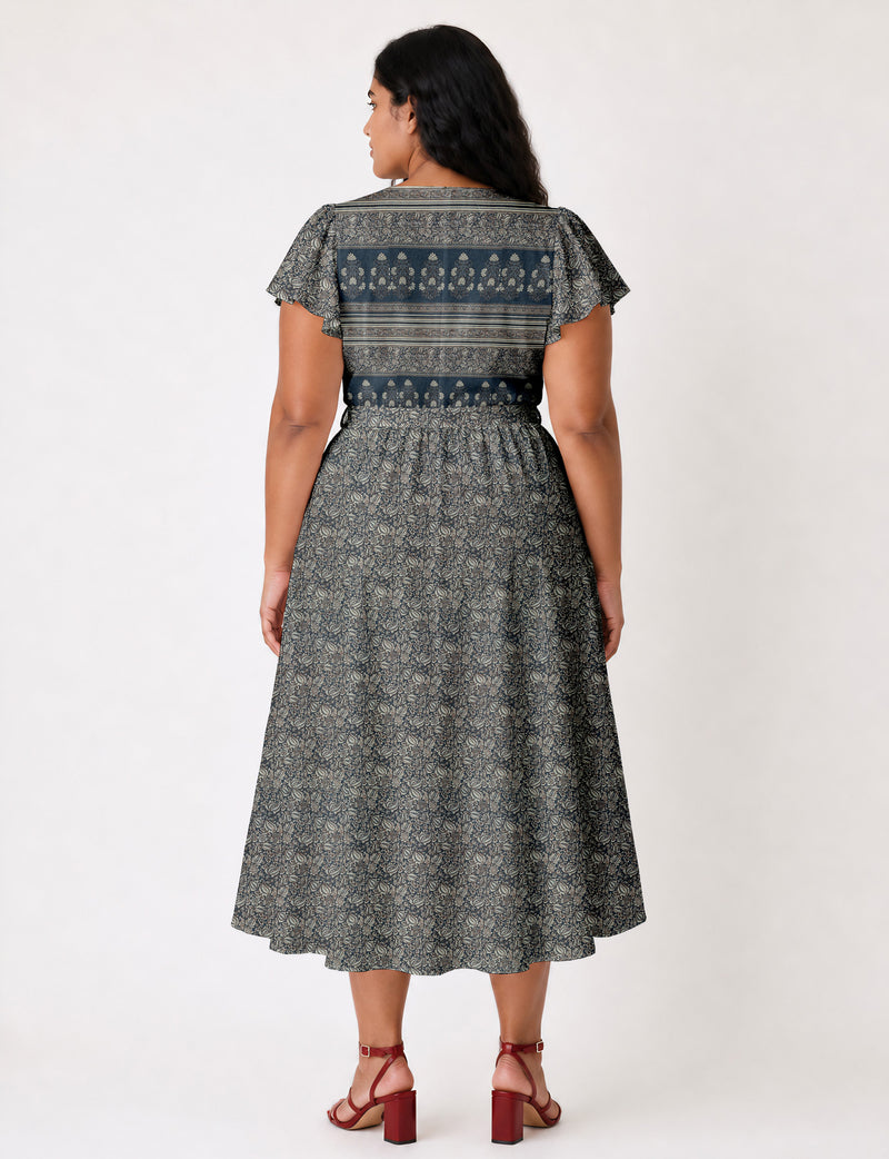 Elegant midi wrap dress with a V-neckline, adjustable waist tie, fitted bodice, and flared skirt for a timeless, flattering silhouette.