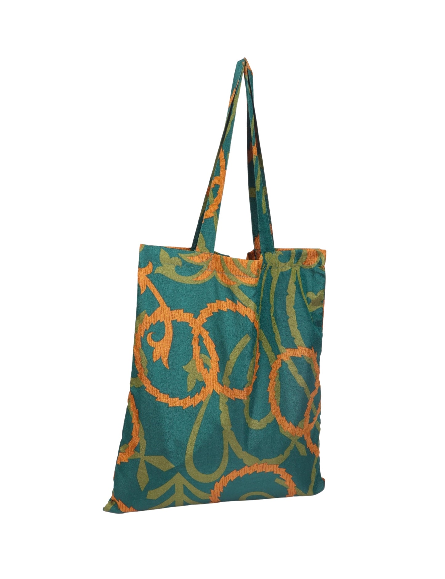 Colorful shopper bag made from recycled sari fabric, representing eco clothing, sustainable women's clothing, carbon neutral fashion, and repurposed clothing — ideal for environmentally friendly lifestyles and conscious clothing choices.