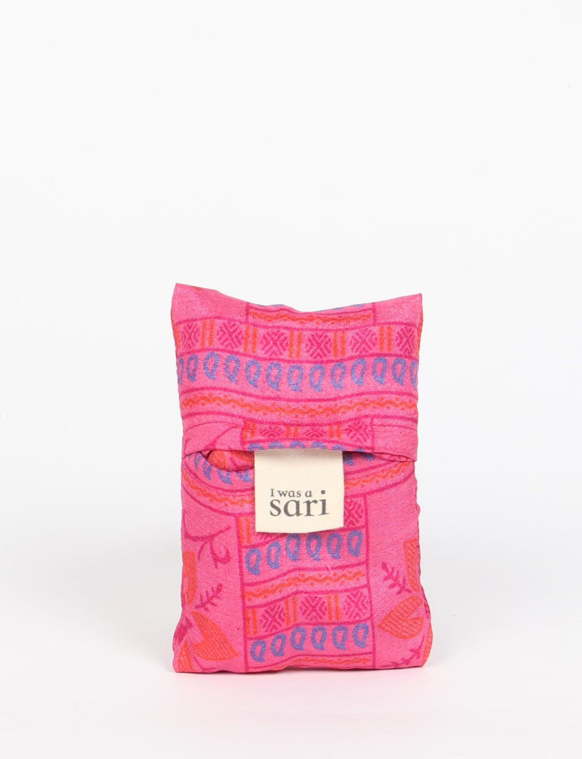 Stay eco-conscious with our Reusable Bag, handmade by Indian artisans from pre-loved saris. Silky and lightweight, this foldaway bag is perfect for your on-the-go lifestyle. Each piece is a unique statement of ethical fashion, embracing sustainability and style.