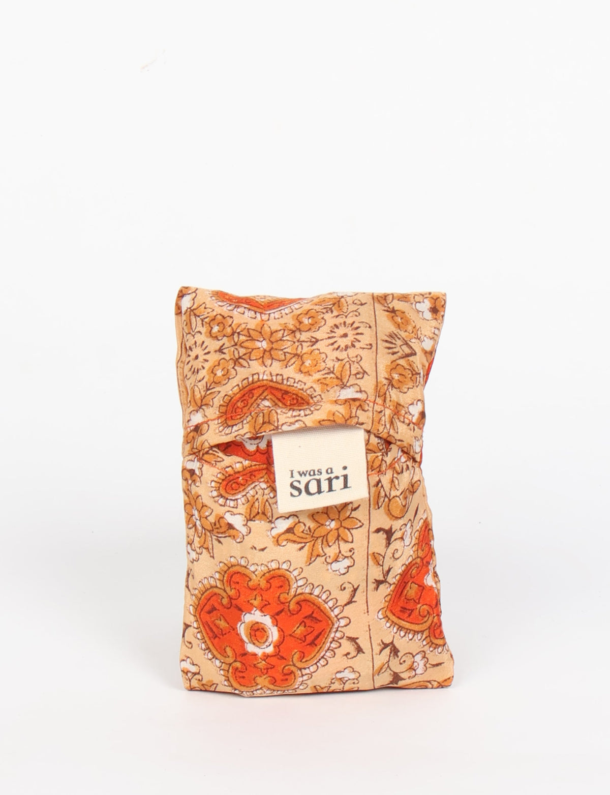 Stay eco-conscious with our Reusable Bag, handmade by Indian artisans from pre-loved saris. Silky and lightweight, this foldaway bag is perfect for your on-the-go lifestyle. Each piece is a unique statement of ethical fashion, embracing sustainability and style.