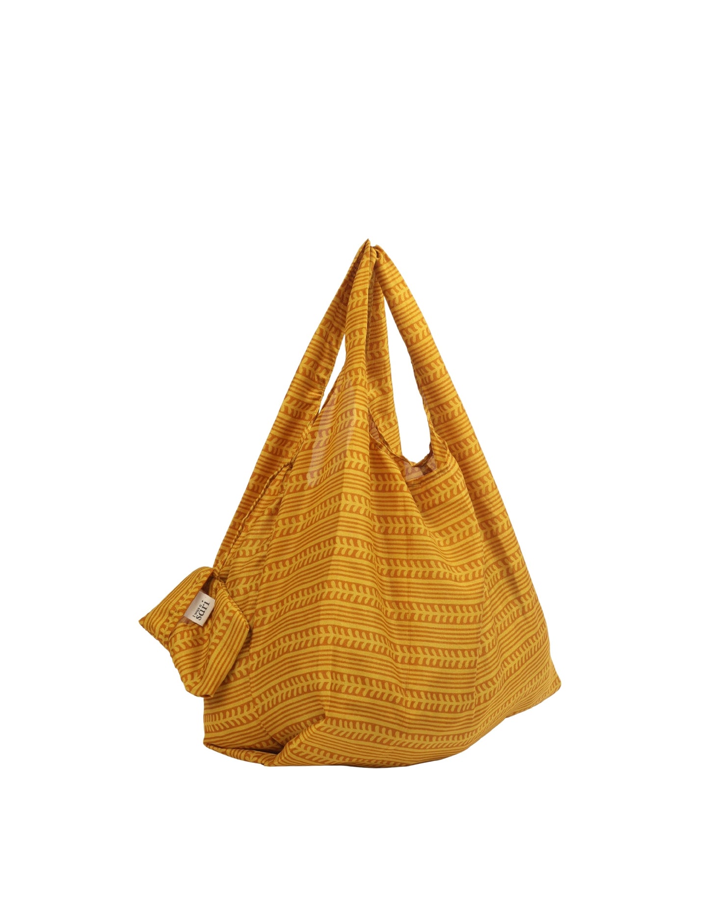 Stay eco-conscious with our Reusable Bag, handmade by Indian artisans from pre-loved saris. Silky and lightweight, this foldaway bag is perfect for your on-the-go lifestyle. Each piece is a unique statement of ethical fashion, embracing sustainability and style.