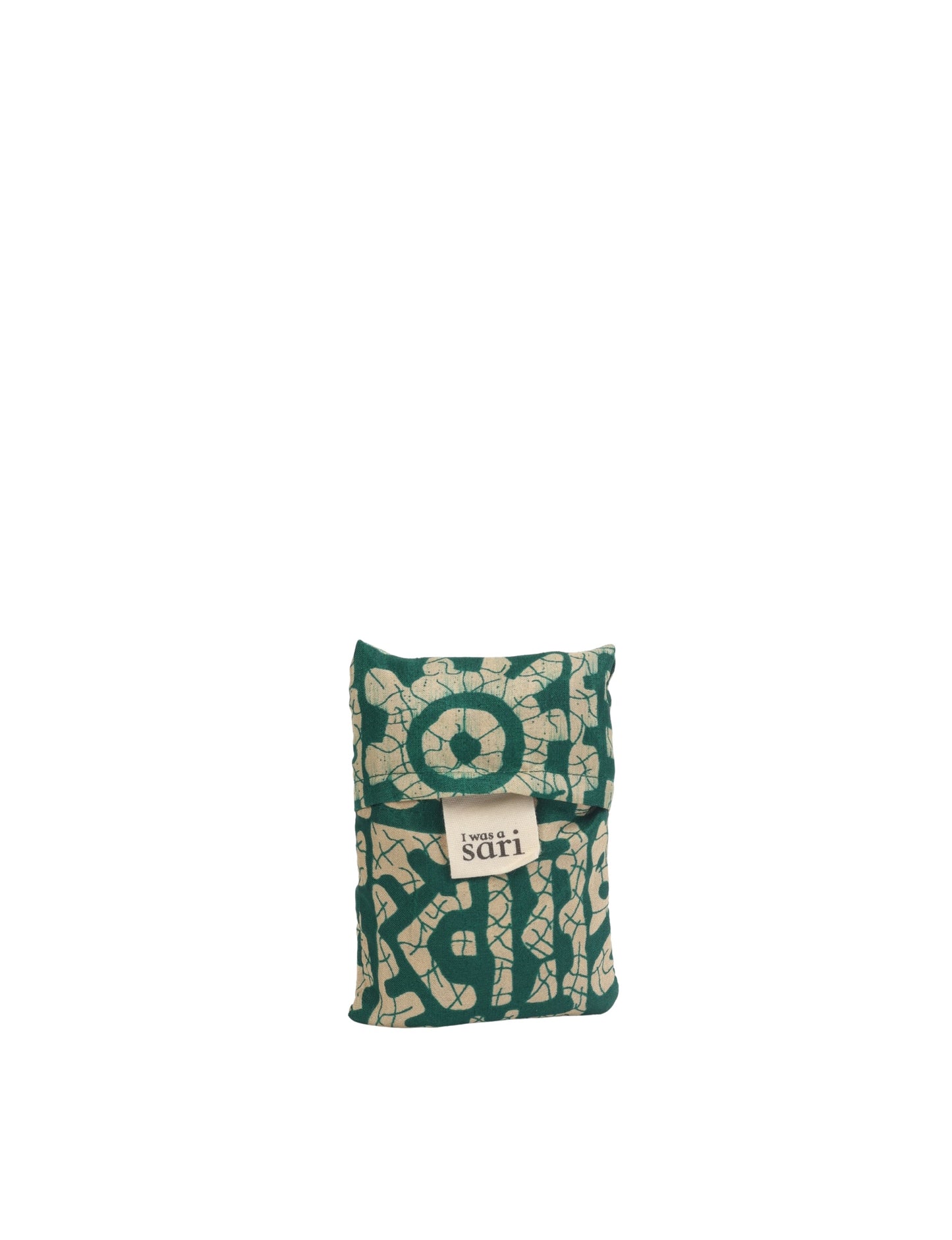 Stay eco-conscious with our Reusable Bag, handmade by Indian artisans from pre-loved saris. Silky and lightweight, this foldaway bag is perfect for your on-the-go lifestyle. Each piece is a unique statement of ethical fashion, embracing sustainability and style.