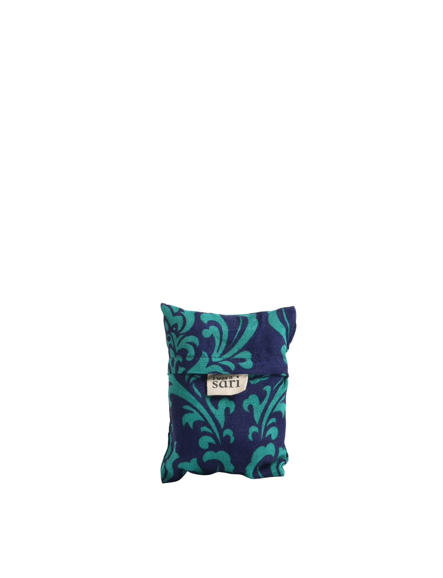 Stay eco-conscious with our Reusable Bag, handmade by Indian artisans from pre-loved saris. Silky and lightweight, this foldaway bag is perfect for your on-the-go lifestyle. Each piece is a unique statement of ethical fashion, embracing sustainability and style.