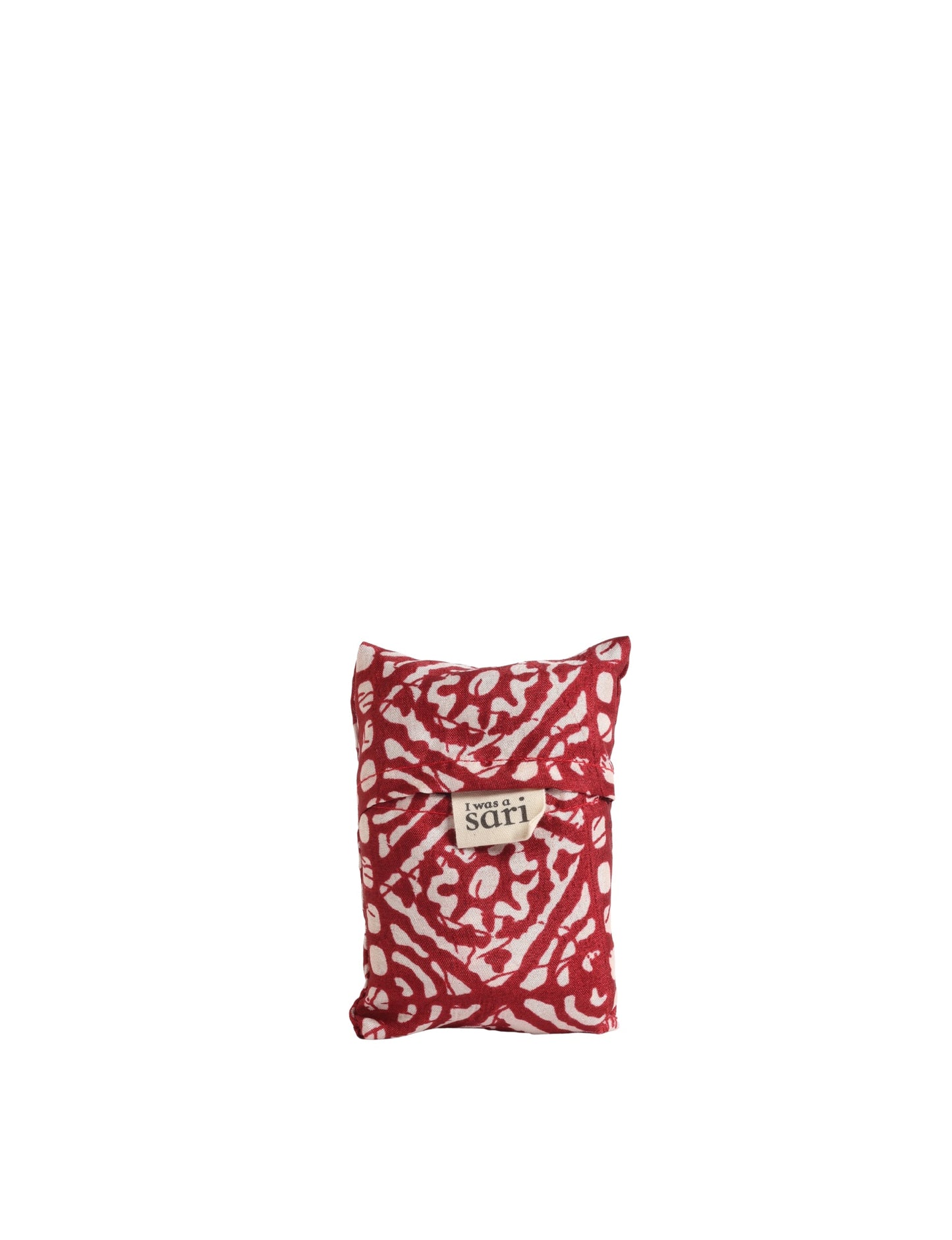 Stay eco-conscious with our Reusable Bag, handmade by Indian artisans from pre-loved saris. Silky and lightweight, this foldaway bag is perfect for your on-the-go lifestyle. Each piece is a unique statement of ethical fashion, embracing sustainability and style.