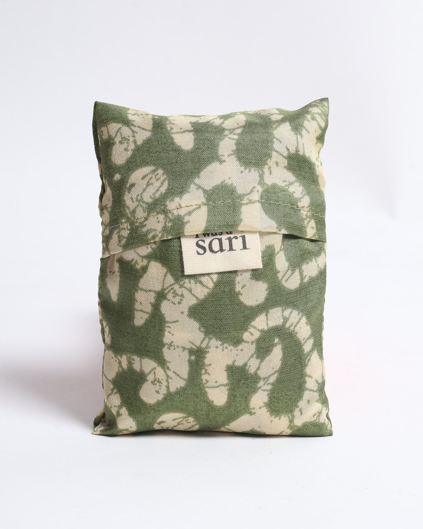 Stay eco-conscious with our Reusable Bag, handmade by Indian artisans from pre-loved saris. Silky and lightweight, this foldaway bag is perfect for your on-the-go lifestyle. Each piece is a unique statement of ethical fashion, embracing sustainability and style.