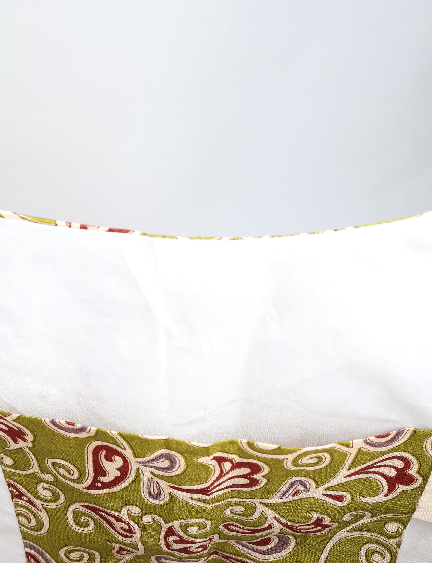 Trapeze bag made from repurposed sari fabric, featuring bold patterns and eco friendly cloth design—part of a sustainable women's clothing collection.