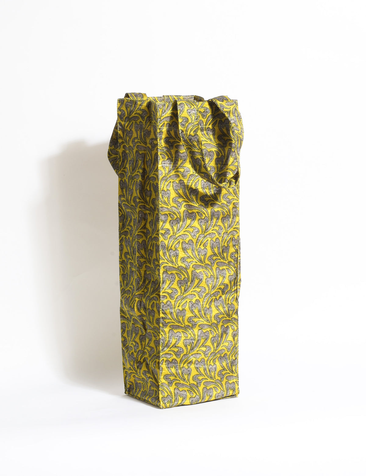 Indulge in eco-conscious wine storage with our Wine Bags, handcrafted from pre-loved saris by Mumbai craftswomen. Sturdy and stylish, these rectangular bags with small handles ensure a leak-free, eco-friendly solution for carrying and storing regular and sparkling wine bottles.