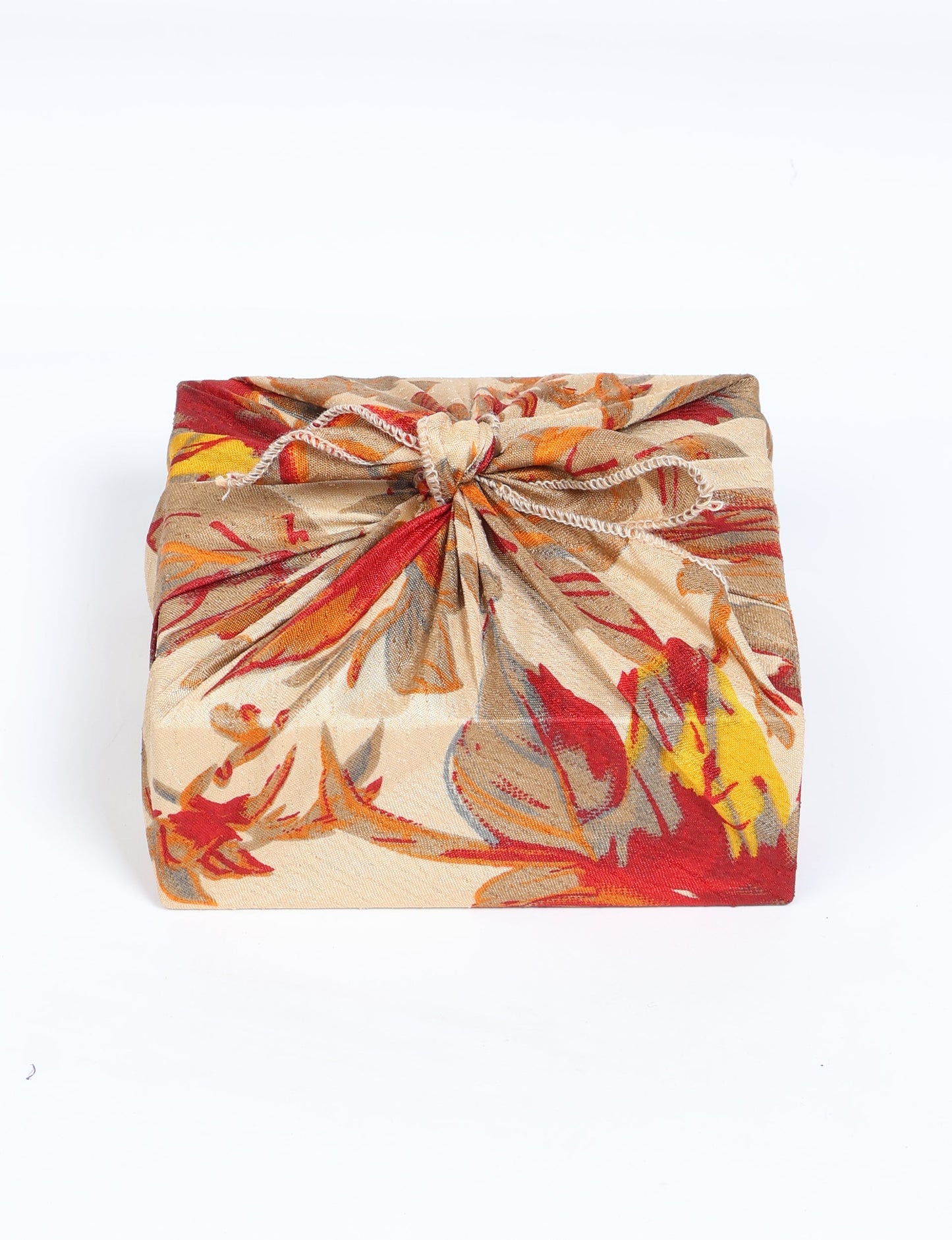 A delicately handcrafted wrap made from recycled sari offcuts, blending sustainable fashion with conscious design. This eco-friendly product showcases the beauty of upcycling and green fashion, making it a perfect accessory for those supporting circular fashion and products made from textile waste.