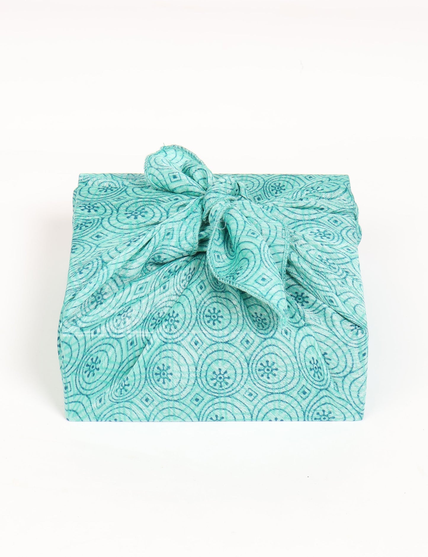 A delicately handcrafted wrap made from recycled sari offcuts, blending sustainable fashion with conscious design. This eco-friendly product showcases the beauty of upcycling and green fashion, making it a perfect accessory for those supporting circular fashion and products made from textile waste.