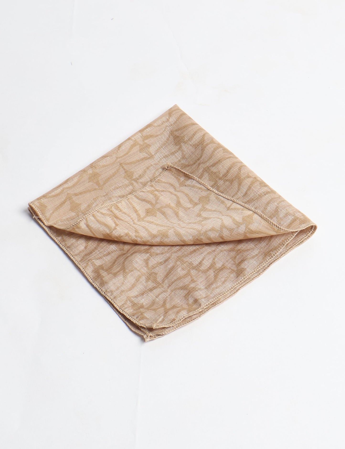 A delicately handcrafted wrap made from recycled sari offcuts, blending sustainable fashion with conscious design. This eco-friendly product showcases the beauty of upcycling and green fashion, making it a perfect accessory for those supporting circular fashion and products made from textile waste.