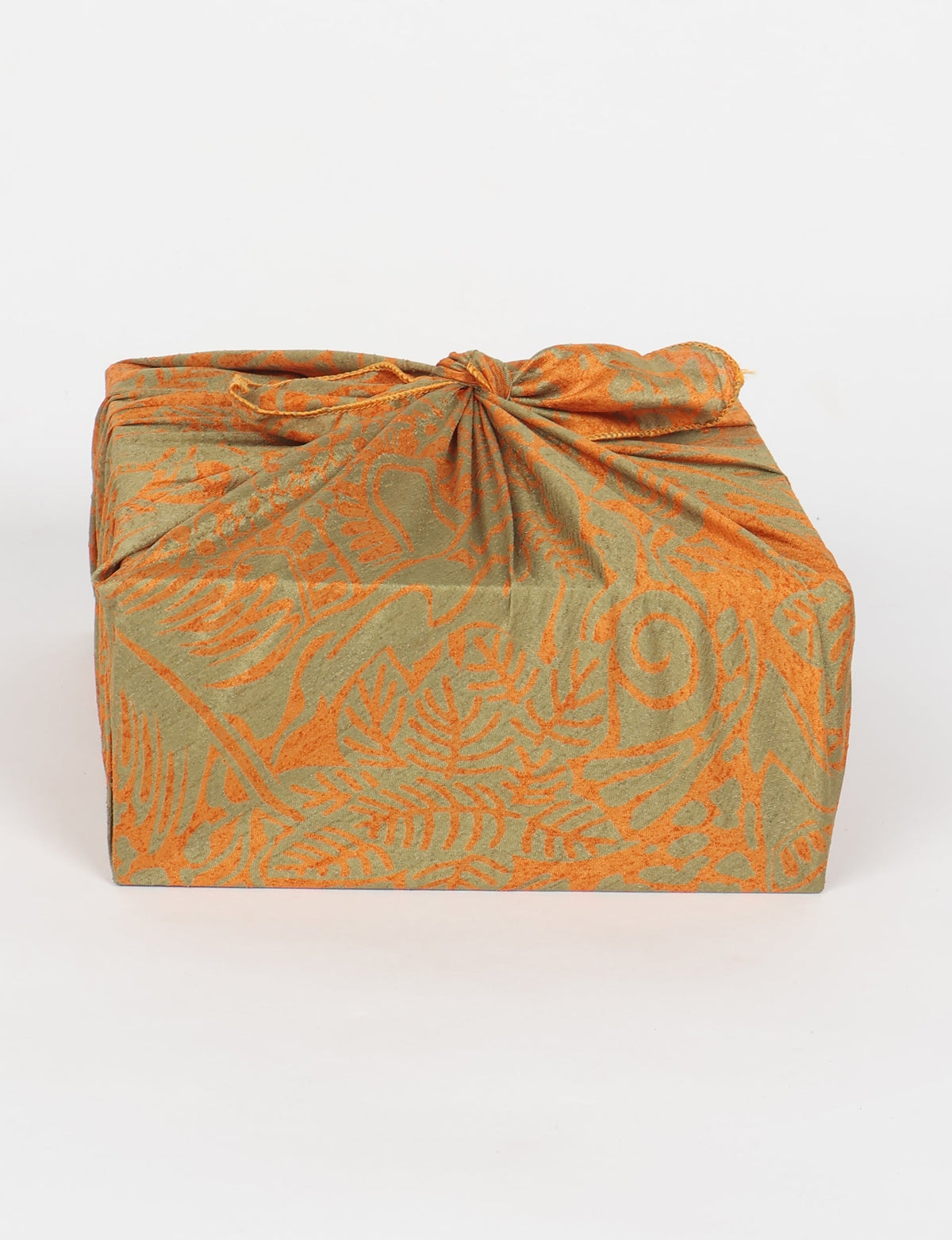 A delicately handcrafted wrap made from recycled sari offcuts, blending sustainable fashion with conscious design. This eco-friendly product showcases the beauty of upcycling and green fashion, making it a perfect accessory for those supporting circular fashion and products made from textile waste.
