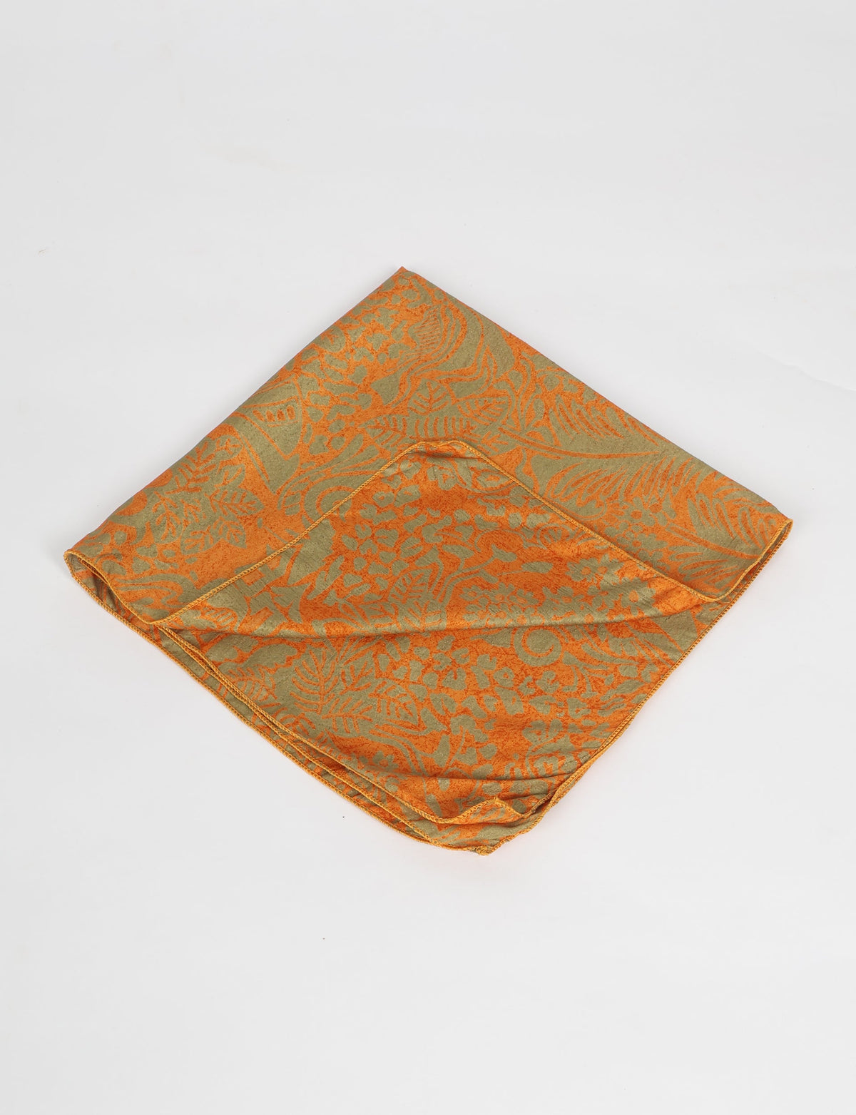 A delicately handcrafted wrap made from recycled sari offcuts, blending sustainable fashion with conscious design. This eco-friendly product showcases the beauty of upcycling and green fashion, making it a perfect accessory for those supporting circular fashion and products made from textile waste.
