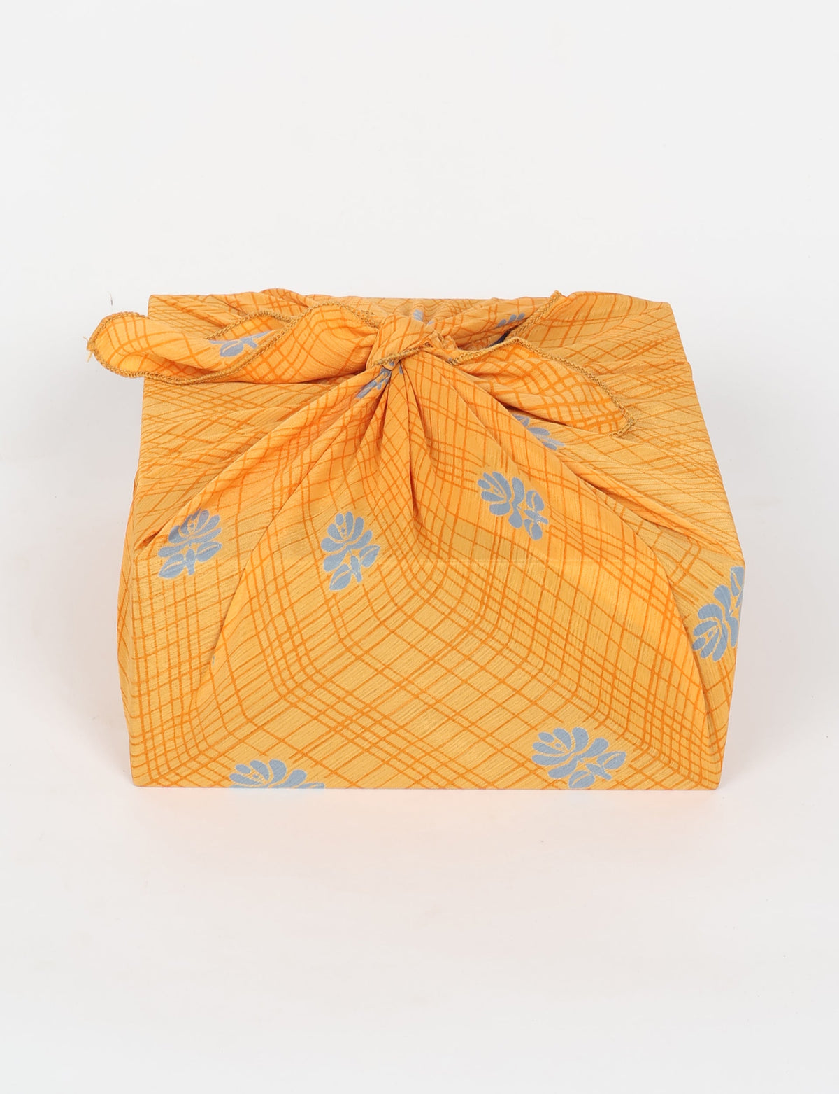 A delicately handcrafted wrap made from recycled sari offcuts, blending sustainable fashion with conscious design. This eco-friendly product showcases the beauty of upcycling and green fashion, making it a perfect accessory for those supporting circular fashion and products made from textile waste.