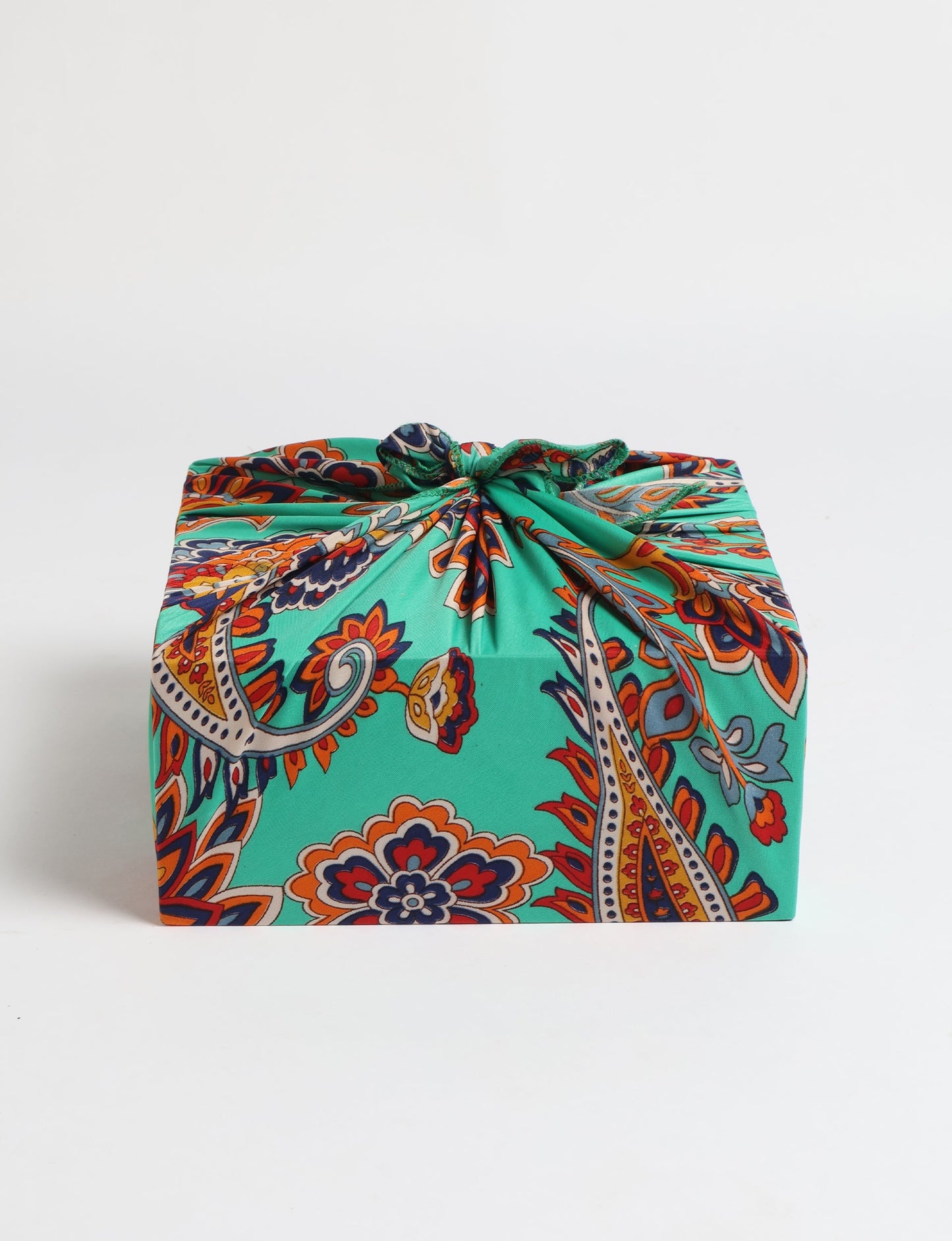 A delicately handcrafted wrap made from recycled sari offcuts, blending sustainable fashion with conscious design. This eco-friendly product showcases the beauty of upcycling and green fashion, making it a perfect accessory for those supporting circular fashion and products made from textile waste.