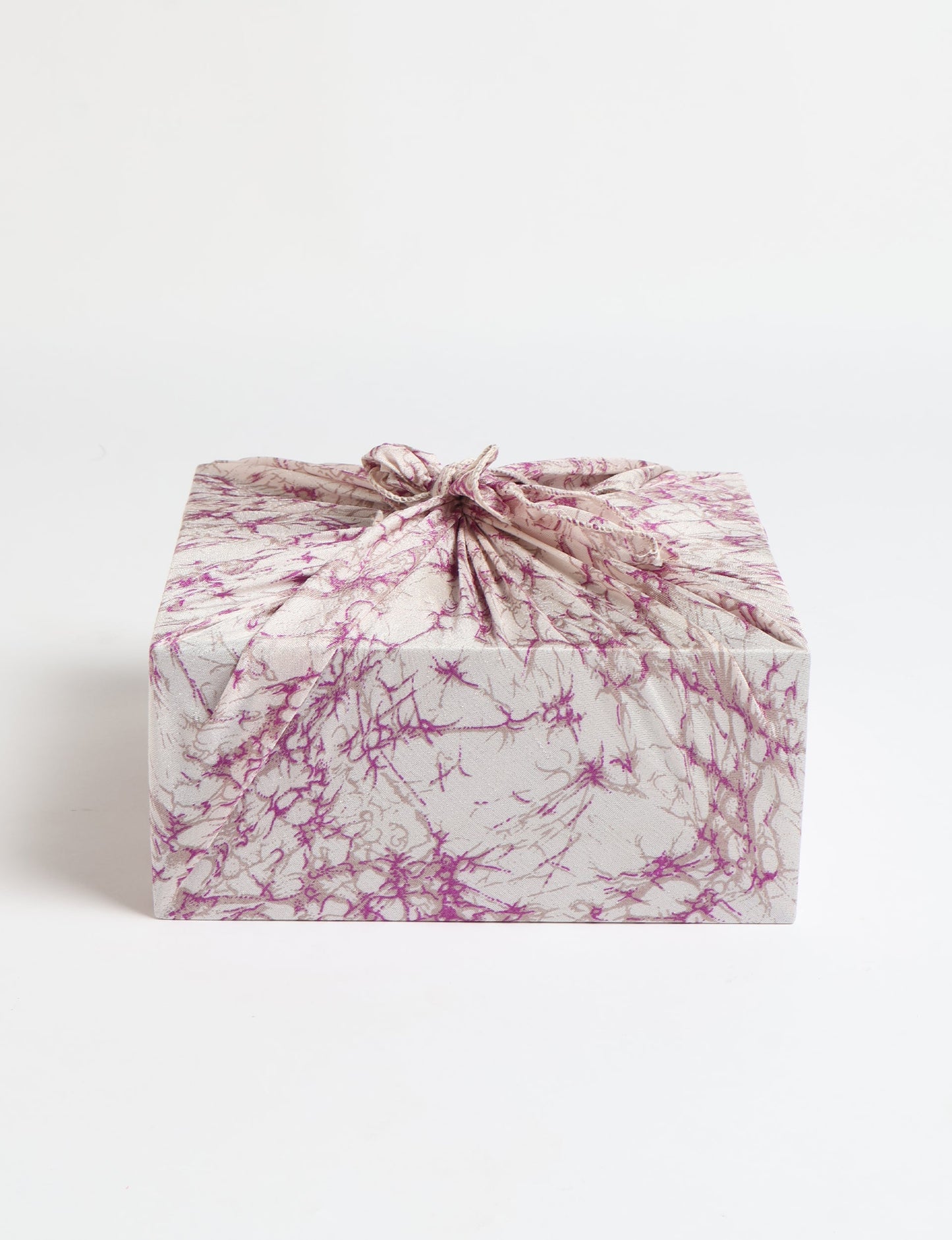 A delicately handcrafted wrap made from recycled sari offcuts, blending sustainable fashion with conscious design. This eco-friendly product showcases the beauty of upcycling and green fashion, making it a perfect accessory for those supporting circular fashion and products made from textile waste.