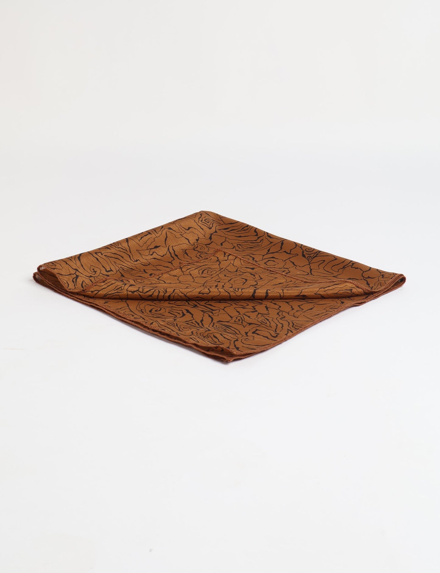 A delicately handcrafted wrap made from recycled sari offcuts, blending sustainable fashion with conscious design. This eco-friendly product showcases the beauty of upcycling and green fashion, making it a perfect accessory for those supporting circular fashion and products made from textile waste.