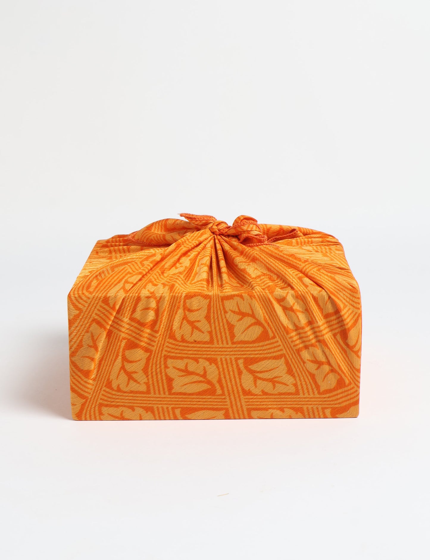 A delicately handcrafted wrap made from recycled sari offcuts, blending sustainable fashion with conscious design. This eco-friendly product showcases the beauty of upcycling and green fashion, making it a perfect accessory for those supporting circular fashion and products made from textile waste.